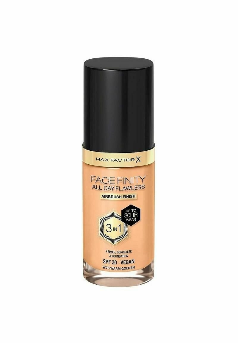 Max Factor Face Finity foundationflaska, cylindrisk form, transparent persikofärgad vätska, svart lock, gyllene etikett, SPF 20, vegansk.
