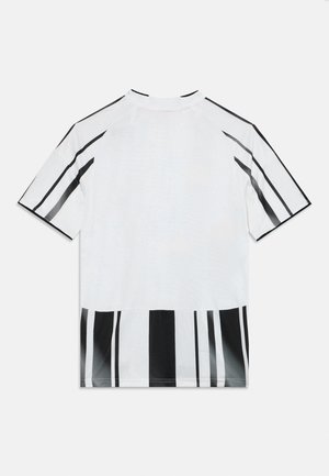 Weißes Kurzarmshirt mit vertikalen schwarzen Streifen am Saum und an den Ärmeln, mit Rundhalsausschnitt und dezentem Muster.