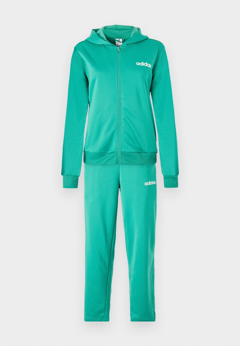 Completo tuta verde con felpa con zip e pantaloni coordinati. Realizzato in tessuto morbido, presenta polsini e vita a costine, con dettagli del logo.