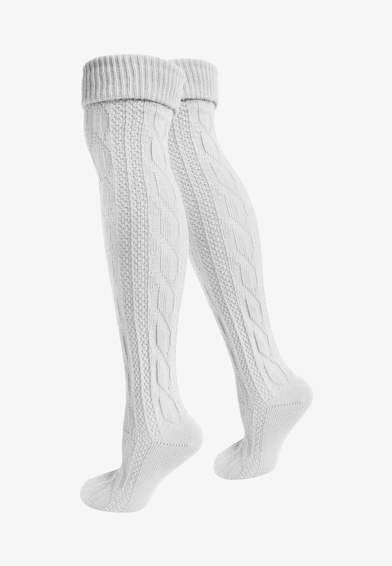 Kniestrümpfe in Weiß, bis zur Wade, mit einem strukturierten Zopfmuster und gerippten Bündchen, aus weichem, gestricktem Material für Komfort und Wärme.
