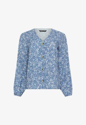 Niebieska, kwiecista bluzka na długi rękaw zapinana na guziki, z dekoltem w serek i elastycznymi mankietami, ozdobiona małymi białymi kwiatkami na całej tkaninie.