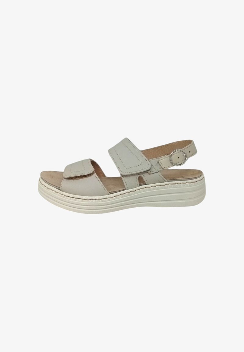 Sandal aperto grigio chiaro con due cinturini regolabili in velcro, una soletta imbottita e una suola piatta bianca spessa.