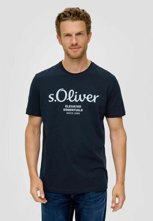 Navy blue cotton t-shirt featuring white text saying "s.Oliver Elevated Essentials Since 1969" on the front. Classic crew neckline.