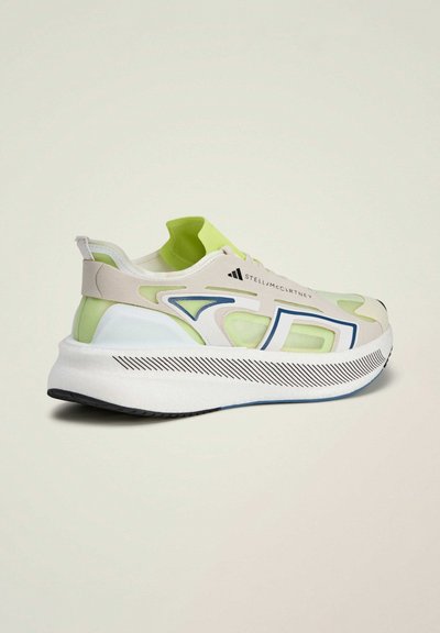 Sneaker with a lightweight design, featuring a pale green upper, white accents, blue and black details, and a textured sole.