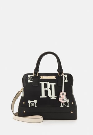 Black handbag made of synthetic material featuring a mix of large white logos and a pink accent tag. Includes dual handles and a removable strap.