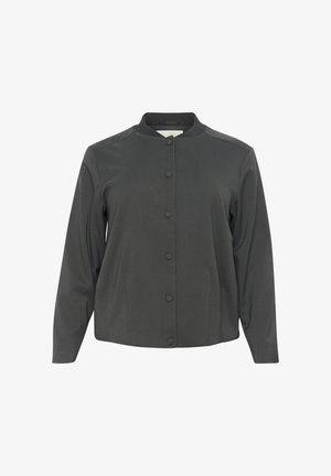 Jachetă gri, cu guler rotund, mâneci lungi și o textură netedă. Prezintă nasturi tip snap și un design casual, structurat.