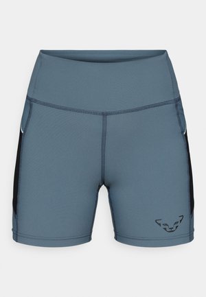 Wysokowzrostowe niebiesko-szare sportowe spodenki z czarnymi bocznymi panelami i małym czarnym logo kota na dolnej lewej nodze.