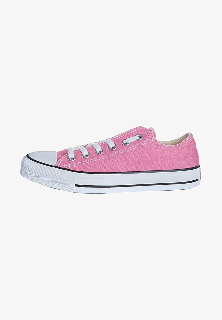 Pink canvas sneaker with white laces, rubber toe cap, and black stripe along the sole. Low-top design with a textured fabric upper.