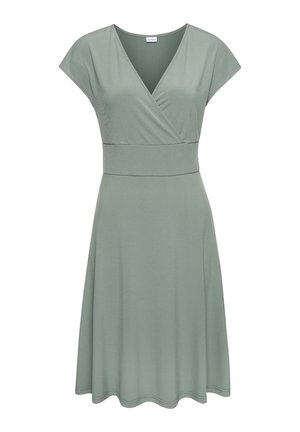 Soft green knee-length dress with short sleeves, V-neck wrap bodice, and fitted waistband, flaring gently at the skirt.