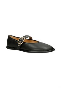 Chaussure plate Mary Jane noire à bout rond et bride réglable avec boucle dorée, présentée sur fond blanc.