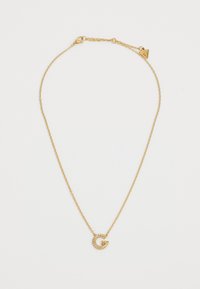 Gouden ketting met een delicate schakel, met een sprankelende letter "G" hanger versierd met strass.