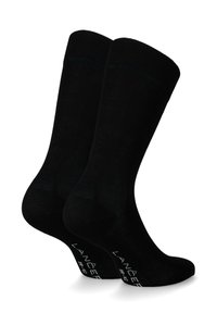 Czarne bawełniane skarpetki z prążkowanym ściągaczem i gładką teksturą. Wyróżniające się logo na podeszwach. Standardowa długość, odpowiednia do noszenia na co dzień.