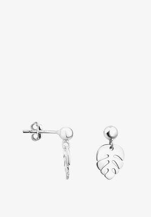 Boucles d'oreilles à clous en argent avec pendentifs en forme de feuille de Monstera polie et pendante, équipées de fermoirs papillon pour un port sécurisé.