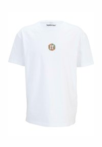 Hvid bomulds t-shirt med rund hals, med et cirkulært, multifarvet logo med "ft" i midten. Korte ærmer, afslappet pasform.