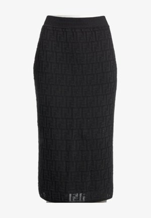 Jupe crayon noire longueur genou avec motif texturé subtil et taille côtelée.