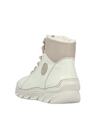 Witte leren hoge schoenen met beige accenten, gestructureerde veters en zachte voering. Rubberen zool met een patroontread voor grip.