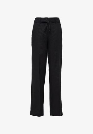 Czarne lniane spodnie o luźnym kroju, z elastycznym paskiem, z przodu z zapięciem na guziki i szerokimi nogawkami. Gładka tekstura, minimalne detale.