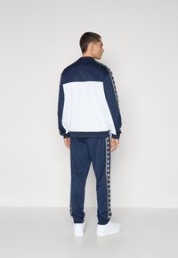 Champion SPORT HERITAGE TRACKSUIT SET - Treniņtērps - navy