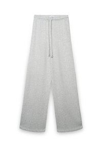 Hellgraue, weit geschnittene Hosen aus weichem, atmungsaktivem Stoff, mit einem elastischen Bund und Kordelzug für eine verstellbare Passform.