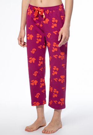 Purple pajama pants with orange floral prints, featuring an elastic waistband and a ribbon tie. Soft cotton fabric, cropped length.