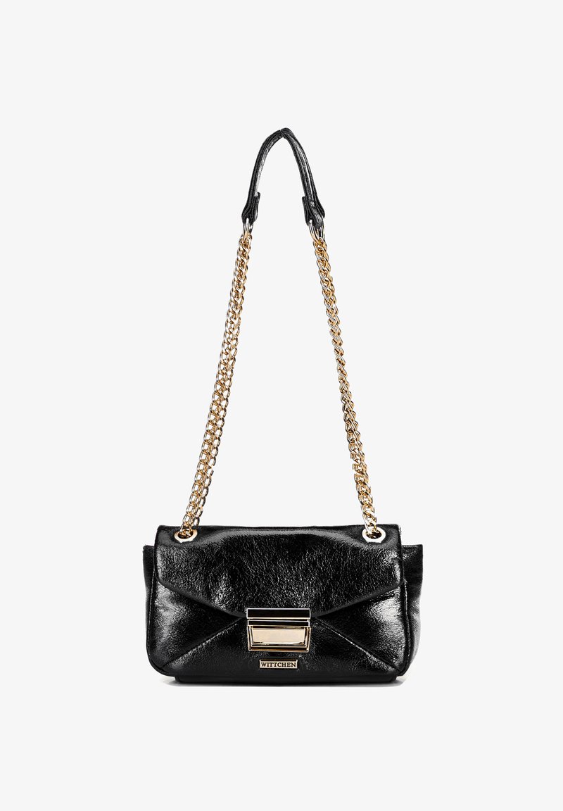 Black leather handbag with a quilted design, gold chain strap, and metallic hardware accent. Features flap closure and logo detail.