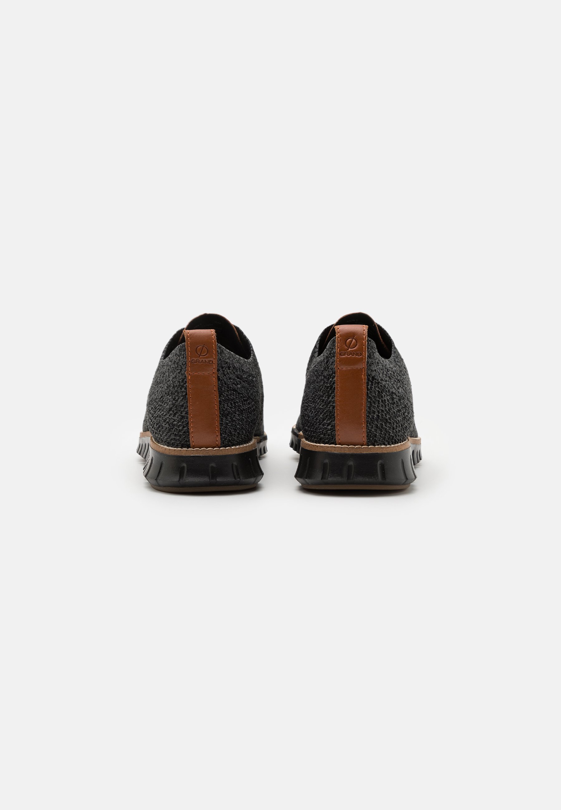 cole haan grandmøtion black stitchlite lace ups