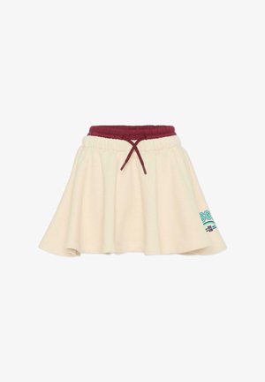 Beżowa bawełniana spódnica z elastycznym bordowym pasem, sznurkiem do regulacji, w fasonie dzwonowym oraz turkusowym detalem graficznym na dolnym skraju.