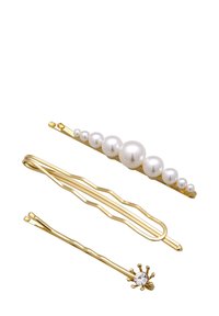 Trois épingles à cheveux : une en or avec des perles blanches, une ondulée en or, et une en or avec un accent ressemblant à un diamant. Toutes présentent des finitions métalliques brillantes.