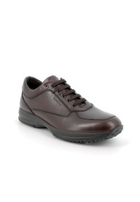 Sneaker in pelle marrone con punta rotonda, chiusura con lacci, colletto imbottito e suola in gomma testurizzata. Presenta dettagli di cucitura sottili e logo.