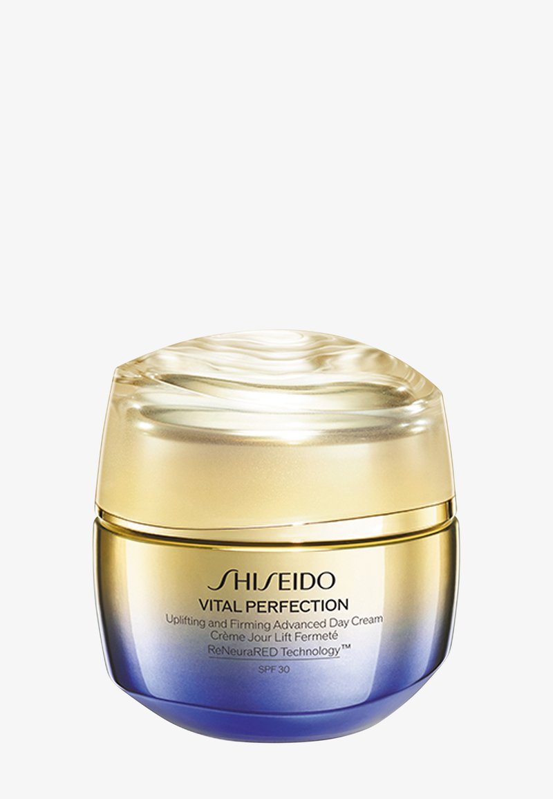 Pot de crème de jour Shiseido Vital Perfection avec dégradé or et bleu, étiqueté revitalisant et raffermissant, doté de la technologie ReNeuraRED SPF 30.