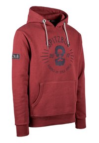 Roter Hoodie mit einer Fronttasche, Kordelzugkapuze und schwarzem Grafikdruck mit einem Schnurrbart und dem Text "SPITZBUB 2017". Gerippte Ärmelbündchen.