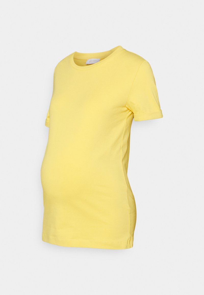 T-shirt de maternidade amarelo feito de algodão macio, com um decote redondo, mangas curtas voltadas para cima e um ajuste flexível para uma barriga em crescimento.