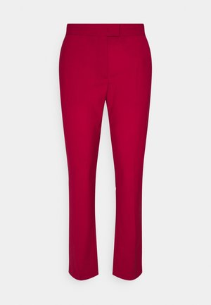 Pantalon droit rouge avec taille haute et fermeture avant dissimulée, présenté sur un fond blanc uni.