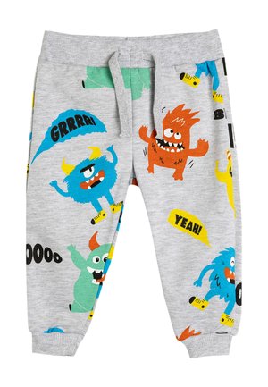 Grå sweatpants med farverige monstergrafikker og tekst som "GRRRR!" og "YEAH!" samt elastisk talje og manchetter.