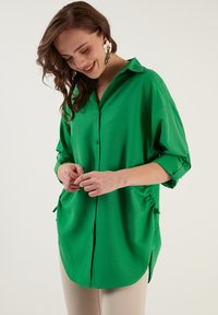 LELA Blusa - benetton color