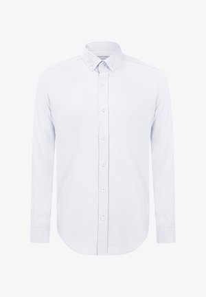 Chemise à manches longues à boutonnage en coton léger de couleur bleu ciel. Présente un col standard, un ourlet droit et six boutons sur le devant. Texture lisse.