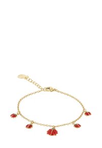 Bracciale in oro con tre charm a forma di coccinella rossa con macchie nere, collegato con una chiusura sicura e una catena di estensione per la regolazione della misura.