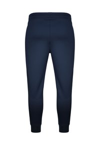 Pantalon de jogging bleu marine slim fit avec taille et poignets élastiques, présenté de dos sur fond blanc uni.
