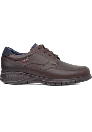 Scarpe in pelle marrone con punta rotonda, design con lacci e collo imbottito. Presentano una suola in gomma testurizzata per aderenza e comfort.