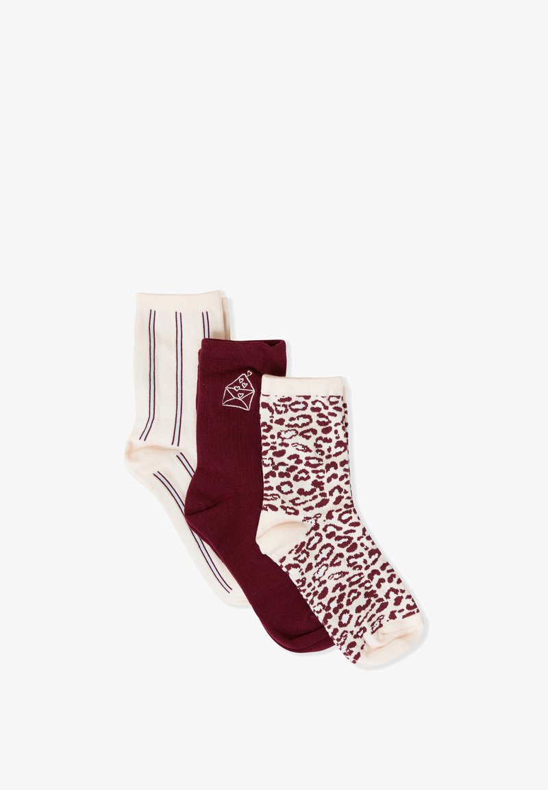 Tres pares de calcetines: uno burdeos sólido, uno crema con rayas burdeos y uno crema con estampado de leopardo. Mezcla de algodón suave con diferentes patrones.
