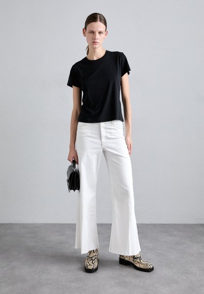 FRAME LE PALAZZO CROP RAW FRAY - Flared Jeans - white