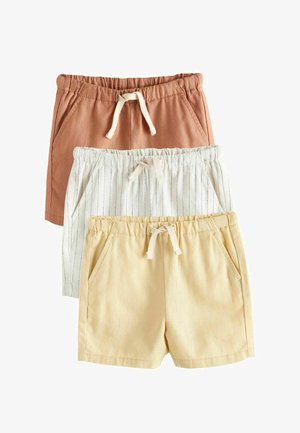 Tres pares de pantalones cortos para niños con cintura elástica y cordones, en colores óxido, blanco con rayas delgadas y amarillo claro, apilados verticalmente.