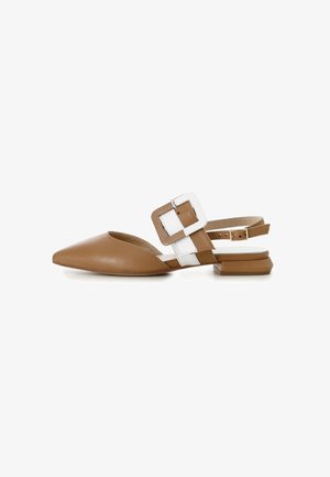 Brown leather slingback shoe with pointed toe, white accents, large square buckle, and low square heel. Smooth texture and minimalist design.