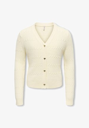 Cardigan tricoté couleur crème avec manches longues et boutons en forme de cœur sur le devant, présentant un motif en maille torsadée texturé.
