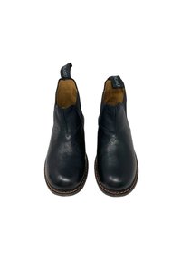 Stivaletti in pelle nera con pannelli laterali elasticizzati, fodera beige e cuciture a contrasto lungo la suola. Progettati per un facile indossamento.