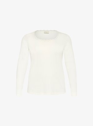 White long-sleeve top with a scalloped neckline and lace trim, featuring a small bow detail at the center front. Soft, fitted fabric.