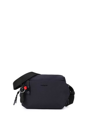 Sac bandoulière bleu foncé avec sangle noire réglable, poche avant zippée et plusieurs tirettes de fermeture éclair et porte-clés sur fond blanc.