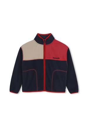 Veste en polaire avec fermeture zippée intégrale sur le devant, en color-block bleu marine, rouge et beige, avec bordure rouge et logo Timberland sur la poitrine.