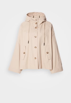 Lys beige hettejakke i en avslappet passform, med knappelukking foran, to sidelommer og justerbare snorer i hetta.