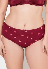 Bordeaux damesondergoed met een bloemenprint in roze en wit, een soepele stofstructuur en een klein strikje op de tailleband.